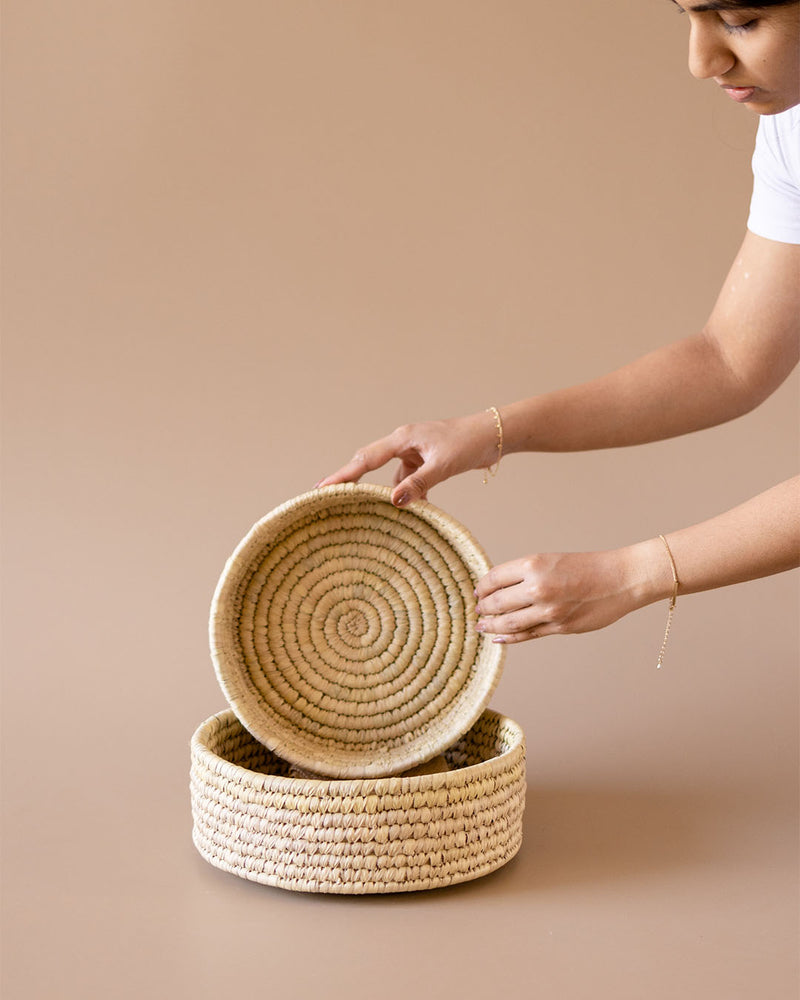 Handwoven round wicker storage basket for  shelf at Kolus